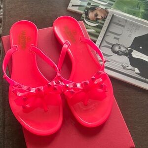 Valentino Women's Neon Pink Studded Sandals
Sold as is.